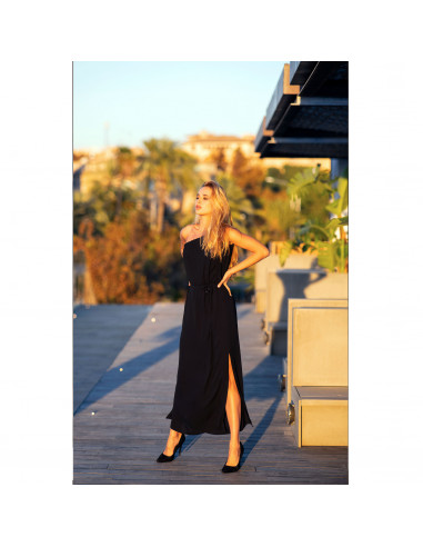 Black flowy maxi dress with asymmetric neckline and leg slit